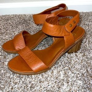 Franco Sarto ankle strap sandals with a short block heel.